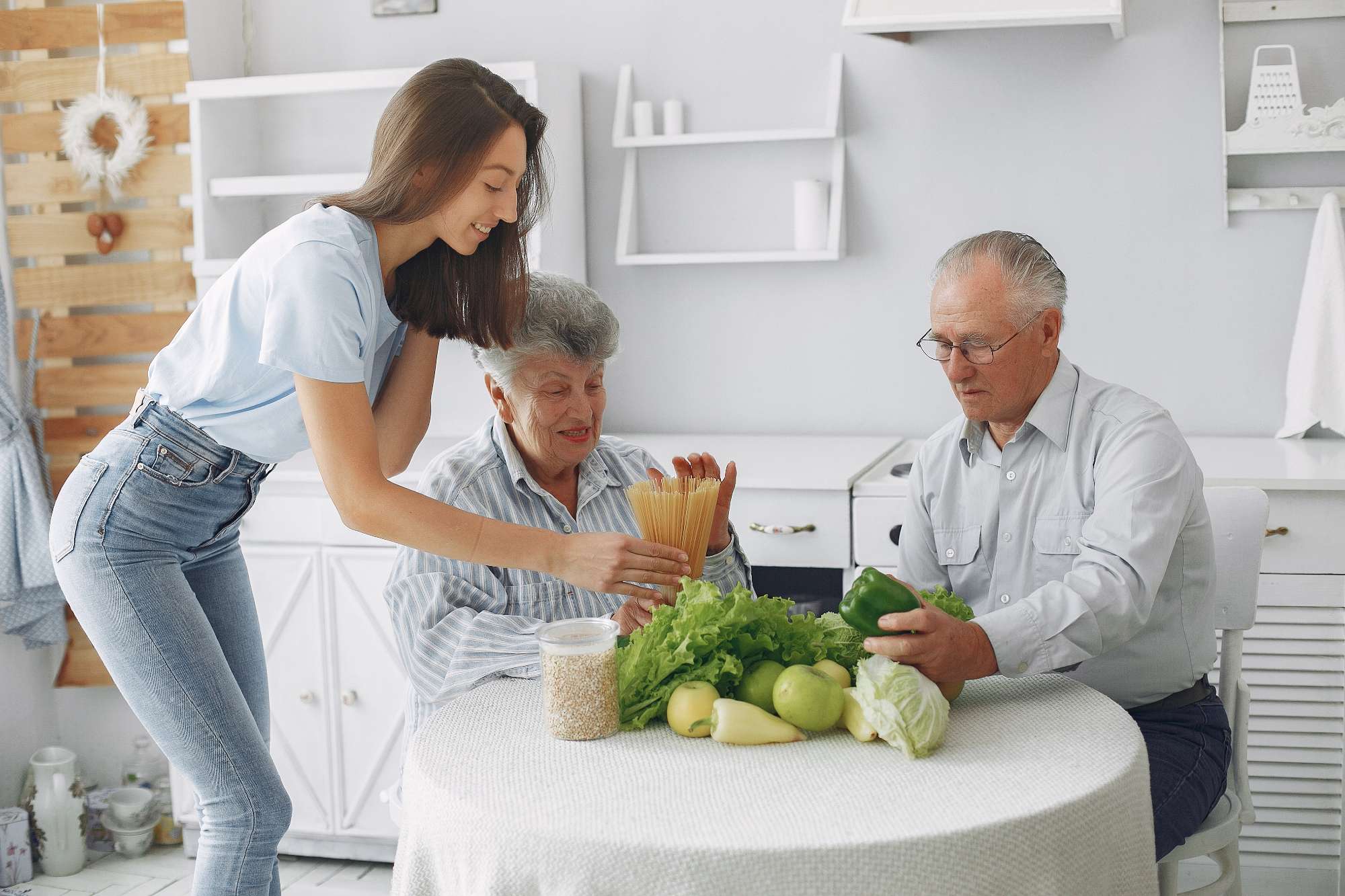 old-couple-kitchen-with-young-granddaughter-(1).jpg